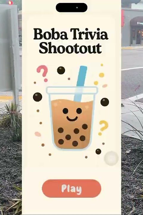 Boba Trivia Shootout on a phone: an AR boba cup floating over a Pasadena street.